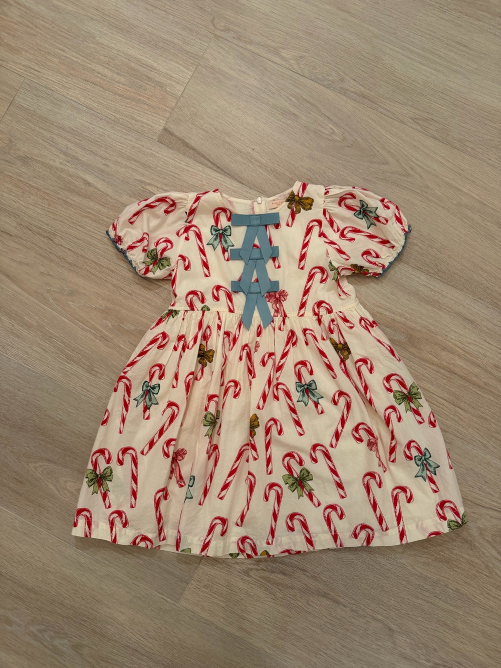 Girls’ Pink Chicken Cream Dress with Red Candy Cane Print and Blue Ribbon